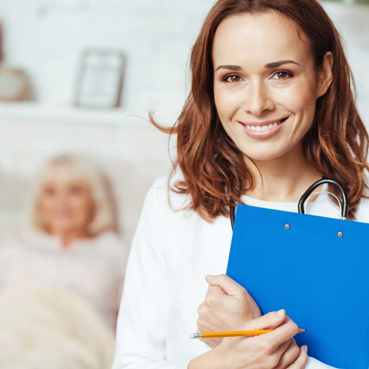 Home health nurse with a patient in Southern California.